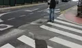 Os sumidoiros da rúa Pintor Corredoira permanecen atascados despois das obras de pavimentación